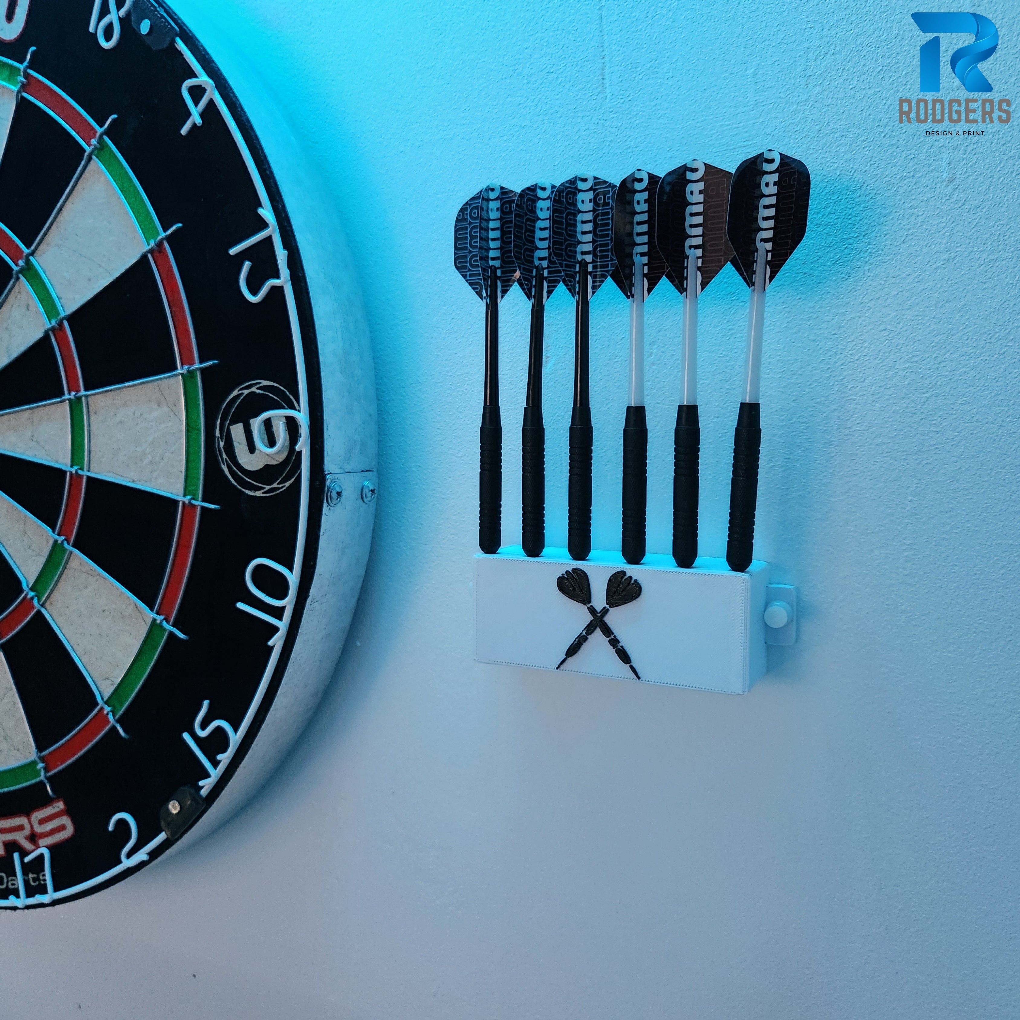 White wall-mountable dart holder securely holding six darts